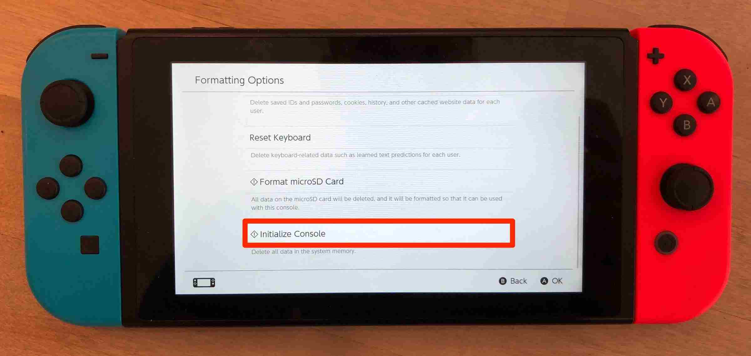 Tap Initialize console to reset Nintendo Switch