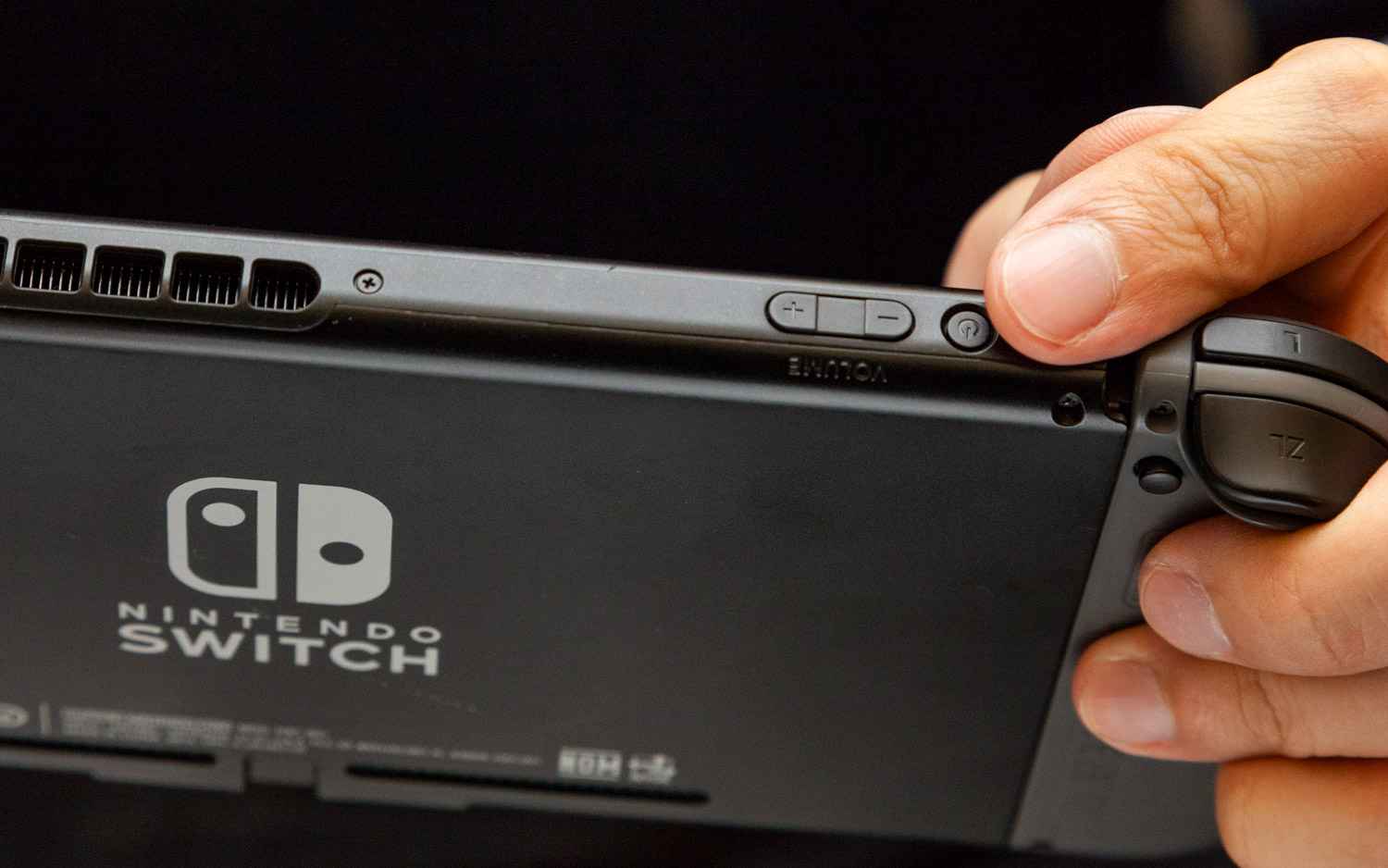 press the power button to turn on the Switch console