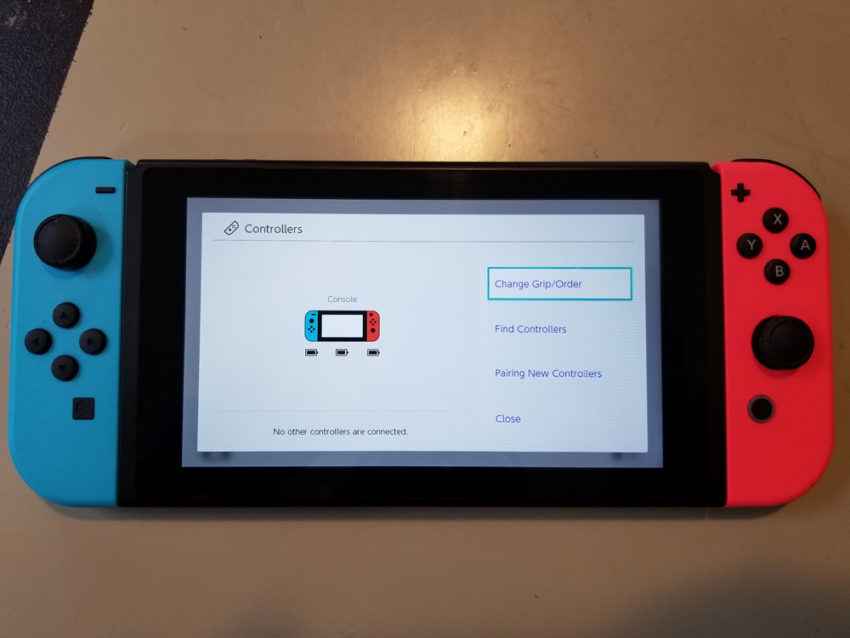 click change grip order to play 2 players on Nintendo Switch