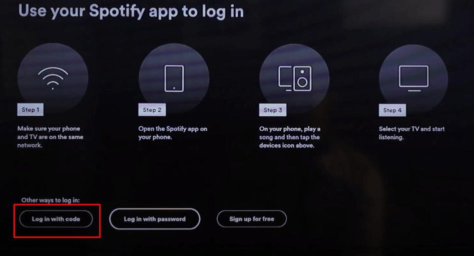Click Log in with code on the Spotify app